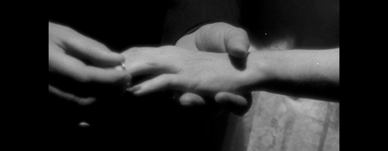 The Hand That Touches the Arm